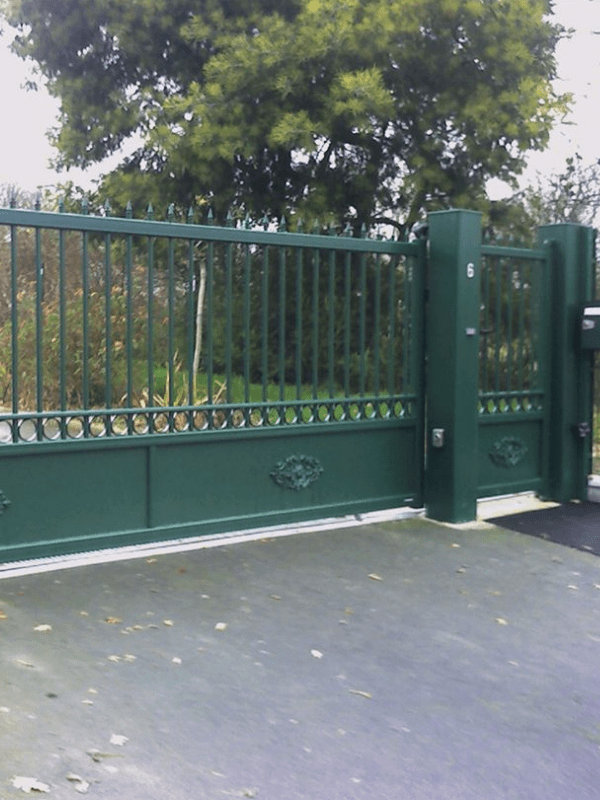 green traditional iron look aluminium gate